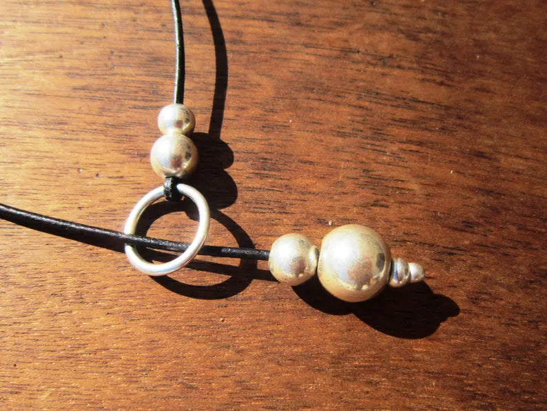 Boho Chic Leather Necklace with Elegant Silver Bead Accents