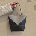 Leather Puzzle Tote Bag – Stylish, Versatile, and Timeless Carryall