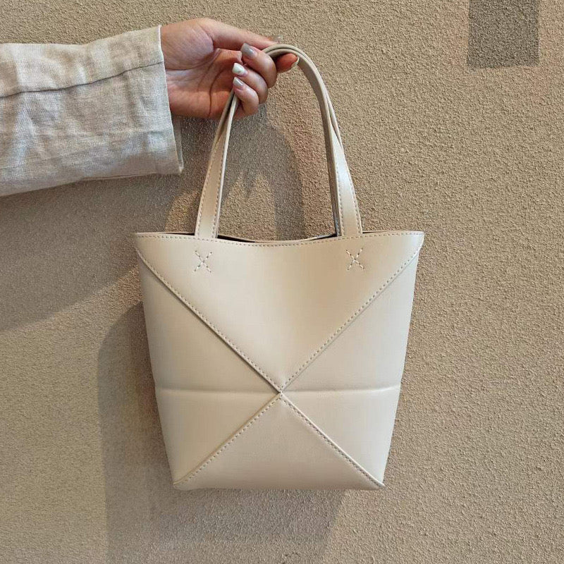 Leather Puzzle Tote Bag – Stylish, Versatile, and Timeless Carryall