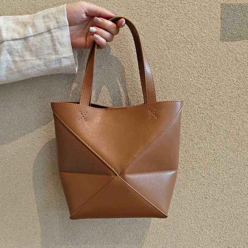 Leather Puzzle Tote Bag – Stylish, Versatile, and Timeless Carryall